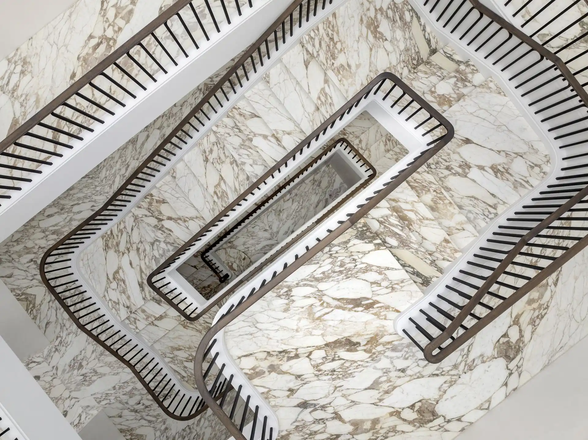Calacatta Orogrigio marble island with mitred waterfall edges installed in Toorak luxury residence.