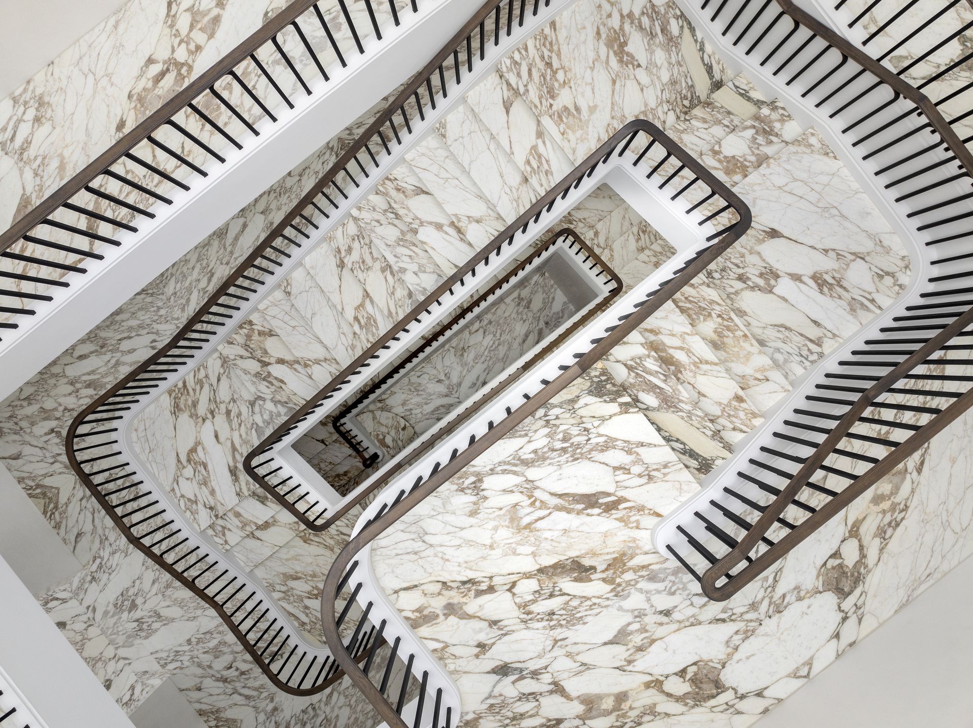 Calacatta Orogrigio marble island with mitred waterfall edges installed in Toorak luxury residence.